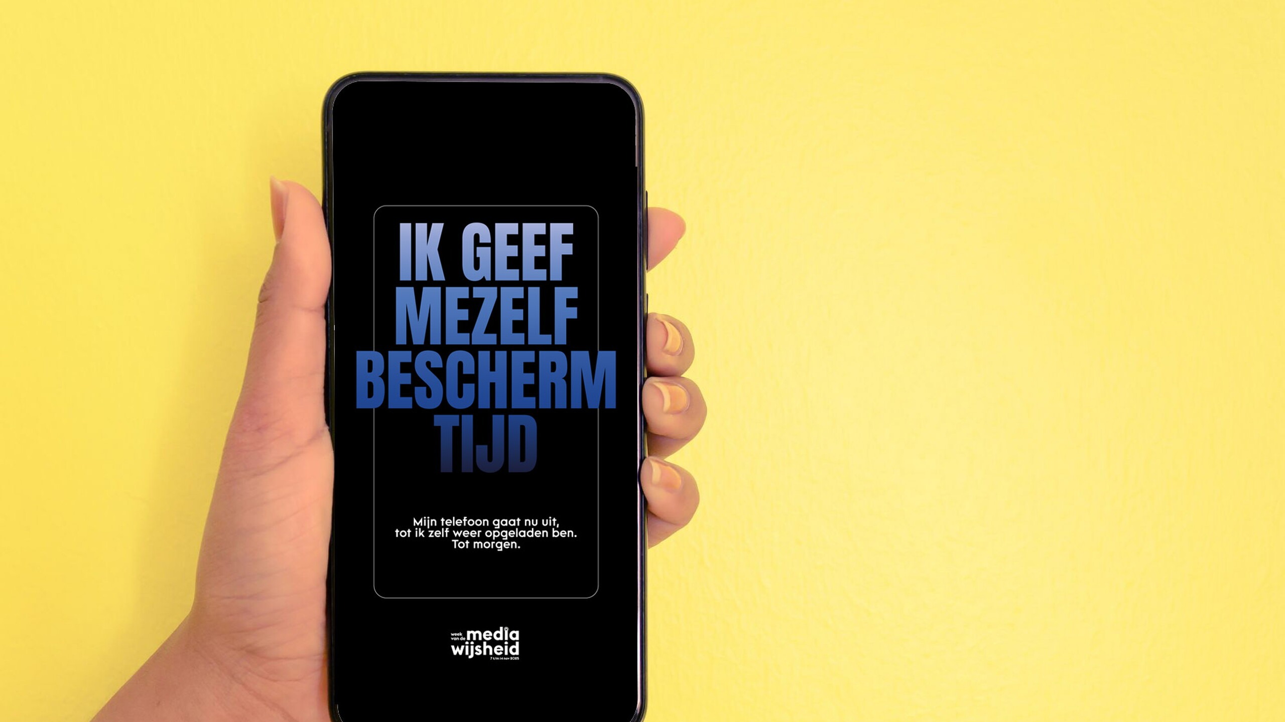 Mobiele telefoon met daarop een afbeelding met de tekst 'Ik geef mezelf beschermtijd'